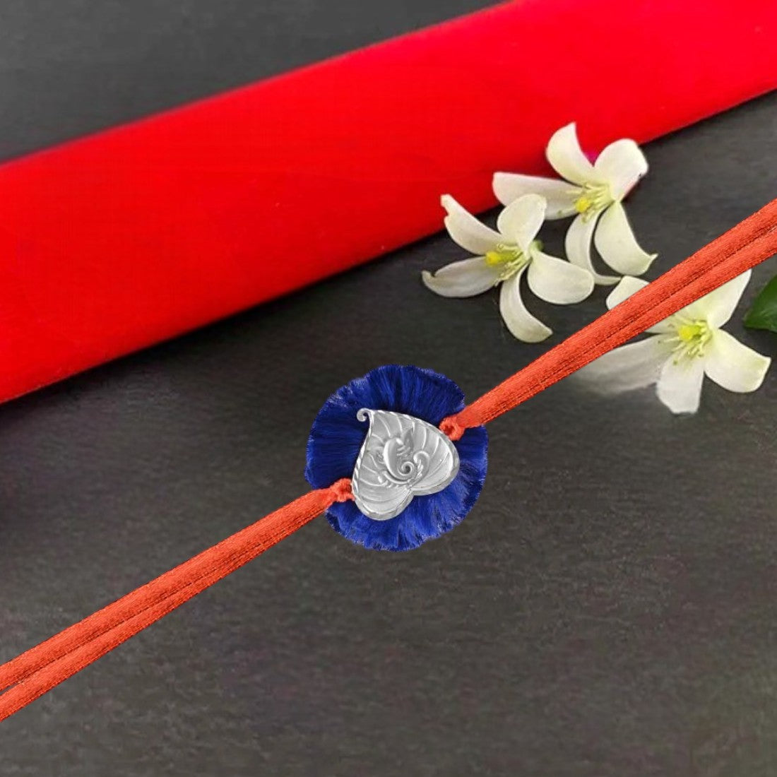 Ganesh In Heart Rakhi In Blue
