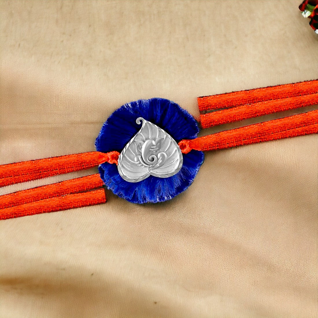Ganesh In Heart Rakhi In Blue