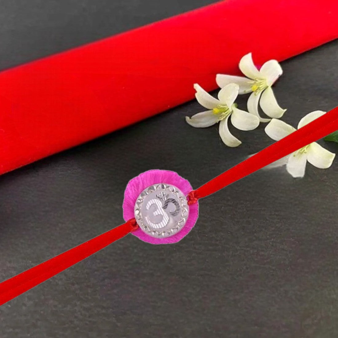 Om Rakhi In Pink