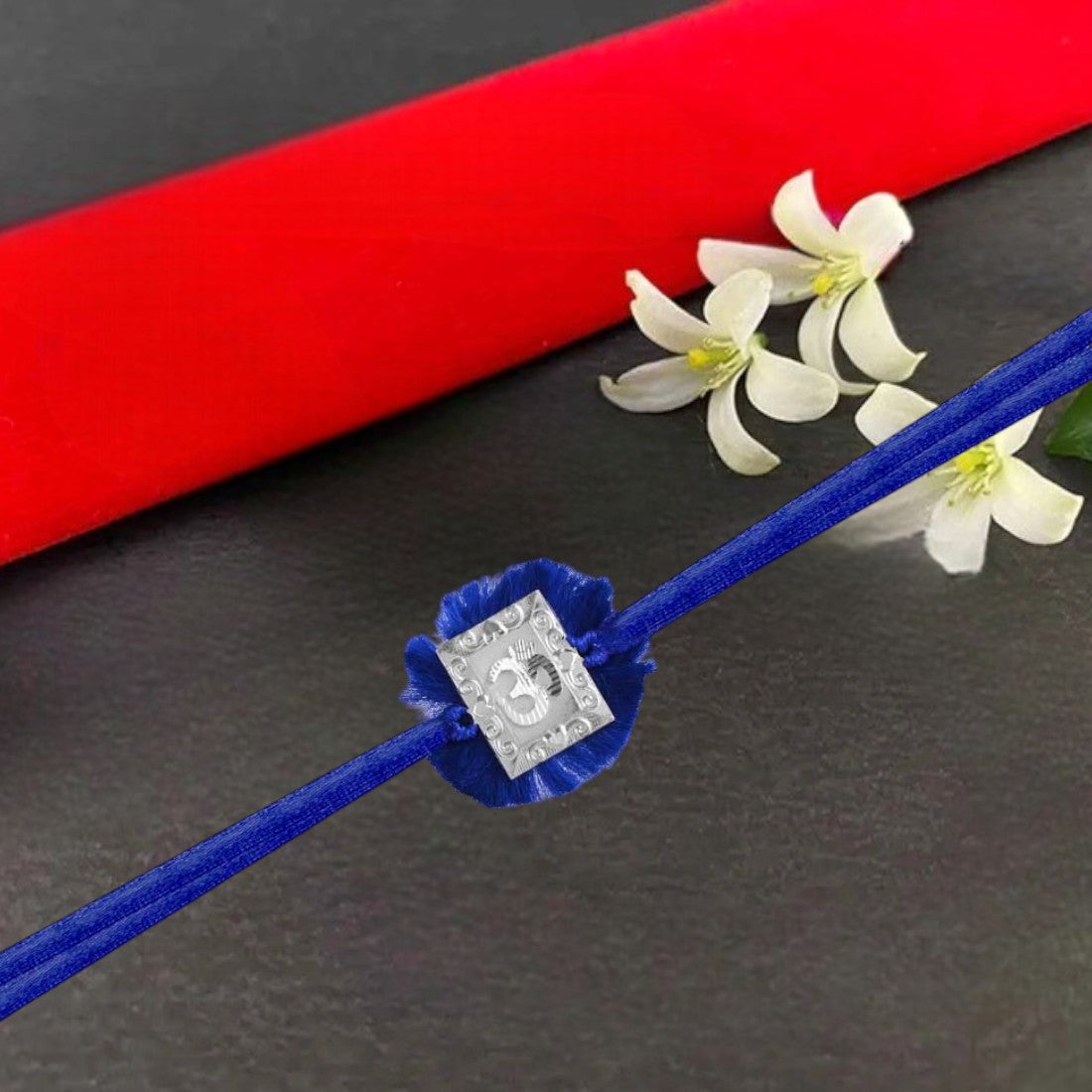 Om Rakhi In Blue